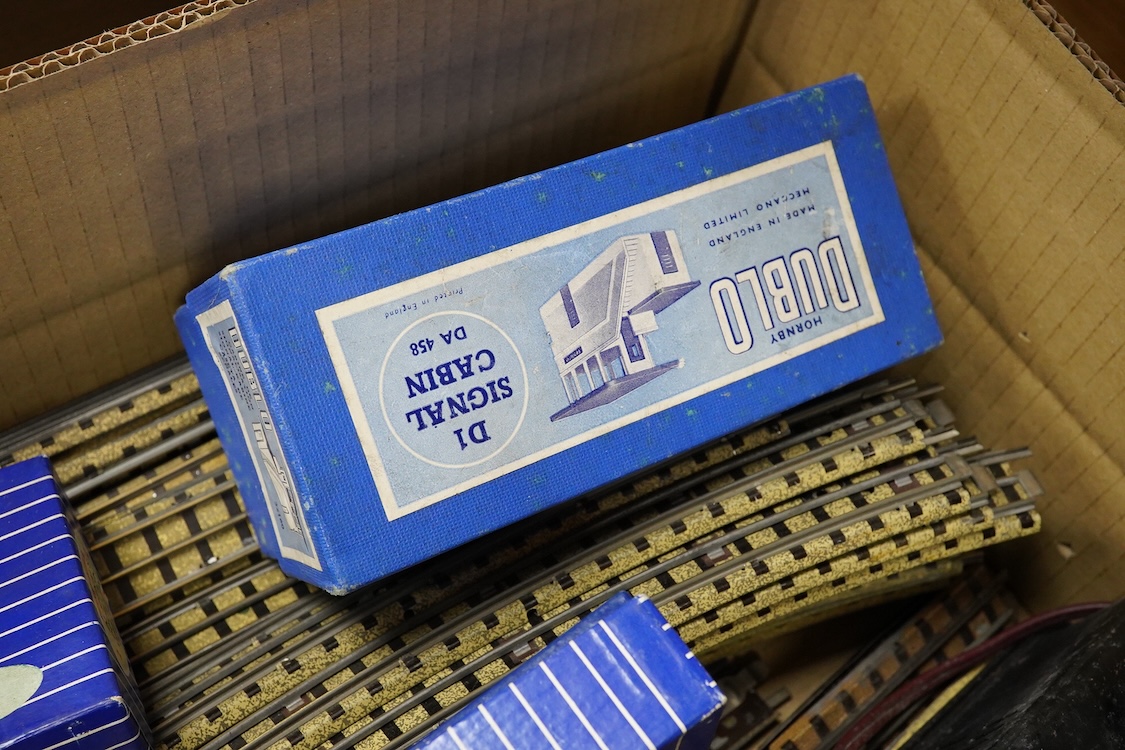 A collection of Hornby Dublo railway for 3-rail running, including two locomotives; an LMS Duchess of Athol 4-6-2, locomotive box, tender unboxed, and a boxed BR Standard Class 4 2-6-4T, 80054, together with five boxed b